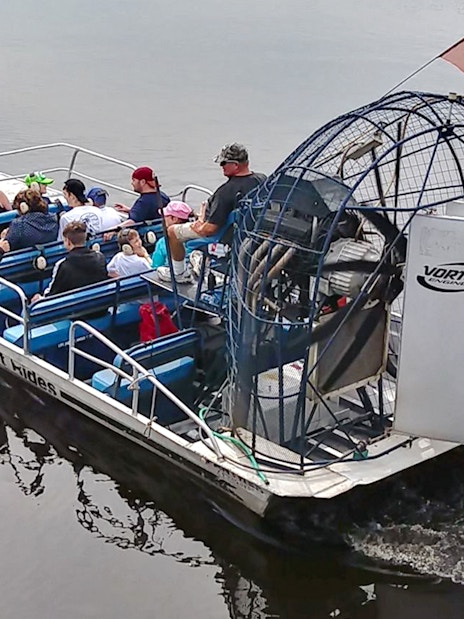 Airboat with passengers on a water safari near Kennedy Space Center.