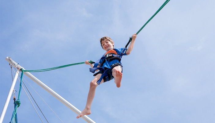 Thrill-seekers on the ESCAPE Penang Slingshot ride in Malaysia.