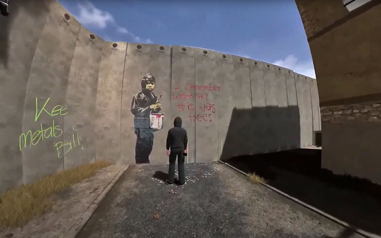 Graffiti art on a concrete wall at Banksy exhibition, Cathedral of the Image.