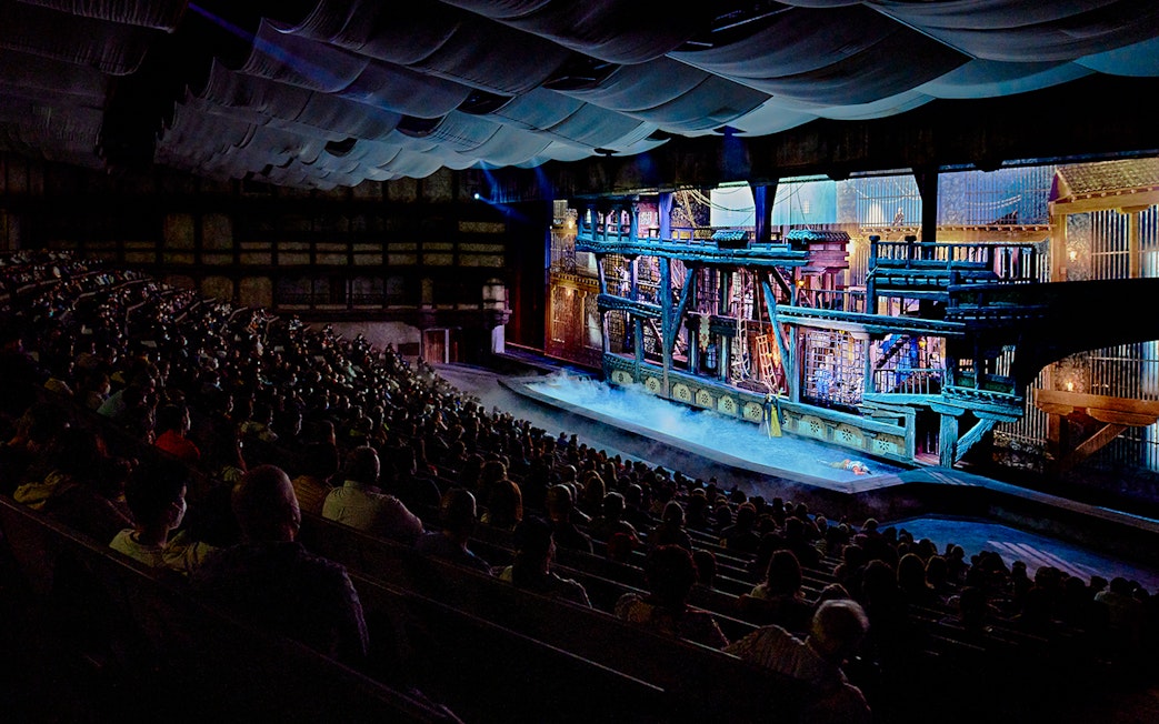 Audience watching a historical performance at Puy du Fou España theater.