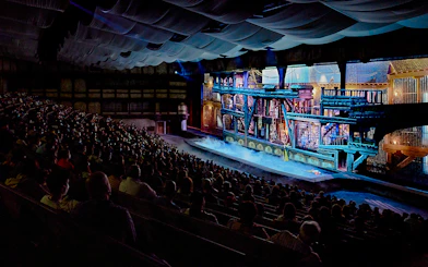 Audience watching a historical performance at Puy du Fou España theater.