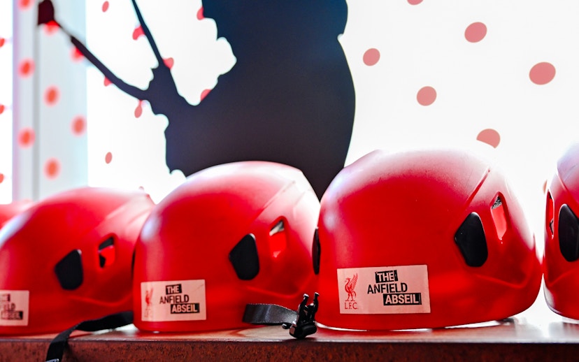Red helmets for Anfield Abseil Experience in Liverpool.