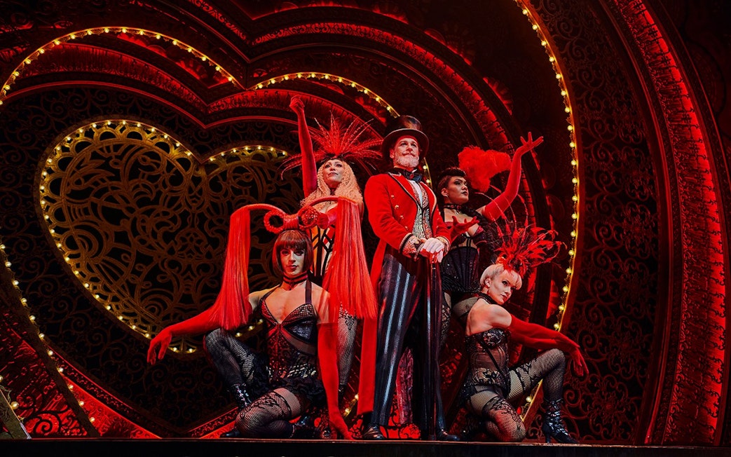 Stage performance of Come Alive Westend with performers in vibrant costumes.