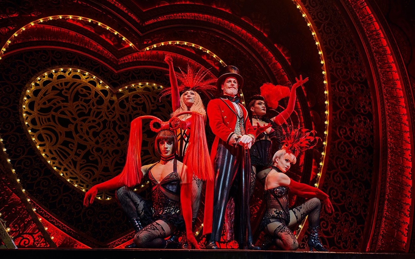 Stage performance of Come Alive Westend with performers in vibrant costumes.