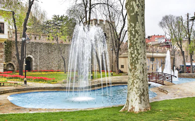 Fountain and stone wall in Gulhane Park, Istanbul, Turkey.
