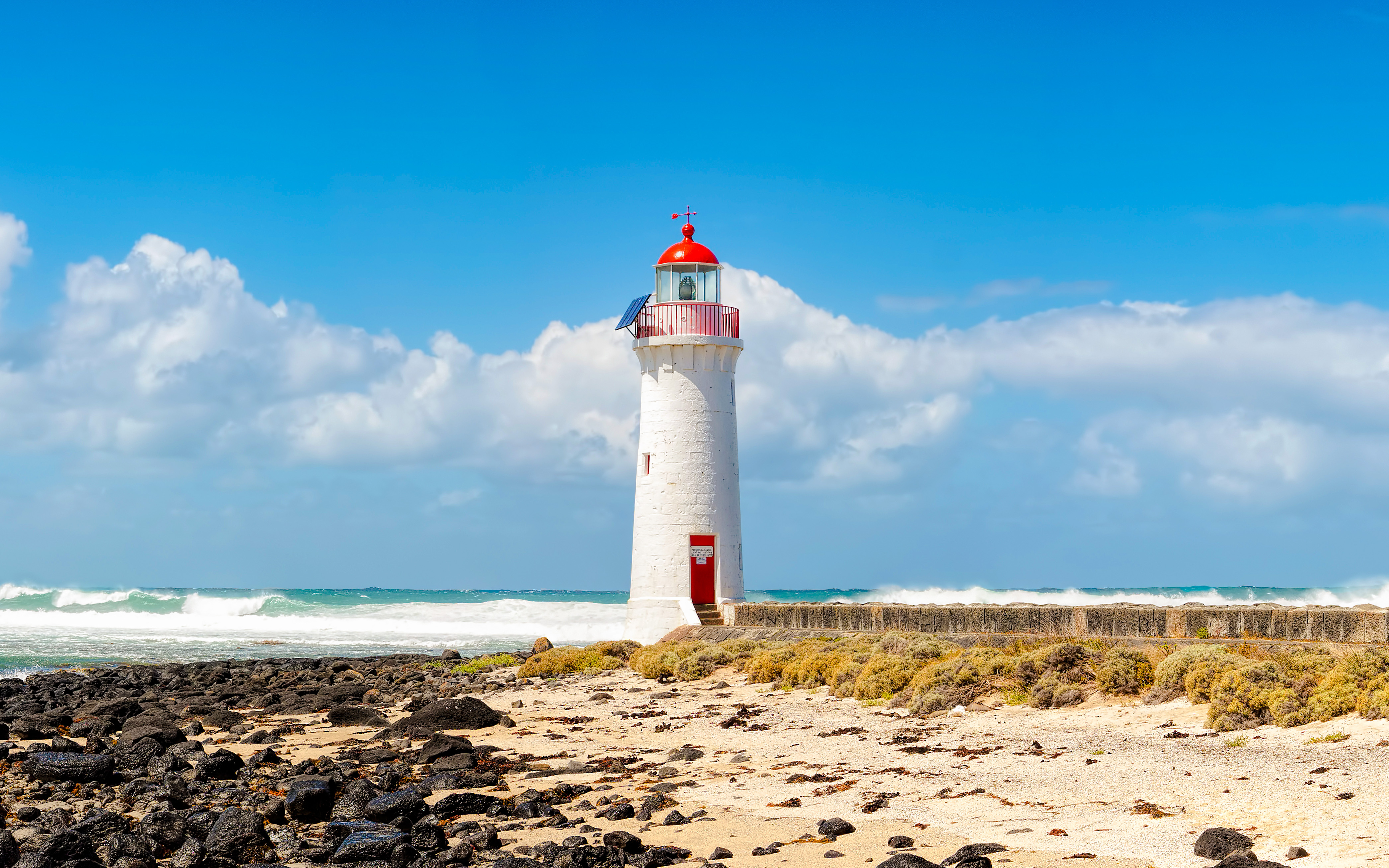 Griffiths Island lighthouse with surrounding coastal landscape in Victoria, Australia.