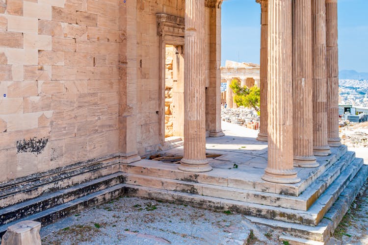 Erechtheion temple with iconic Poseidon's Trident mark on Acropolis' north side floor, Athens, Greece.