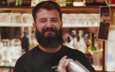 Tirana Pub Crawl: Guided Nightlife Tour with Entry to Three Venues, Welcome Drinks, and DJ Entertainment