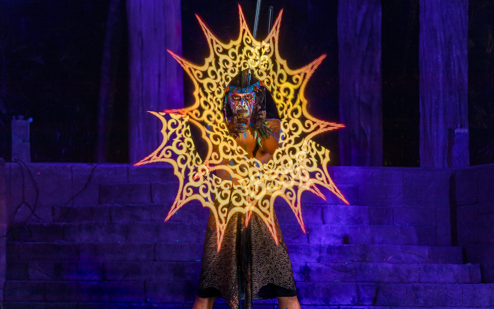 Performer with glowing patterns at Sunway Lost World Hot Springs Night Park.