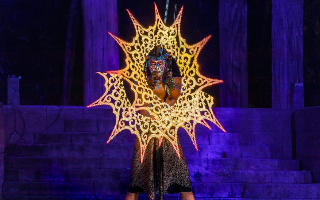 Performer with glowing patterns at Sunway Lost World Hot Springs Night Park.