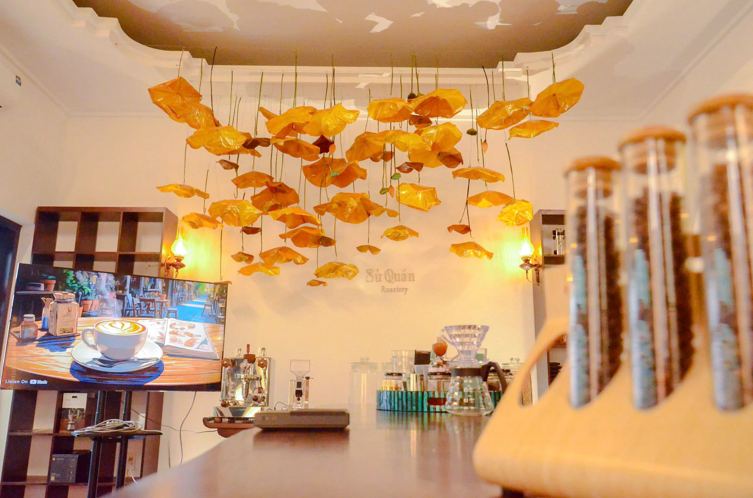 Traditional Vietnamese coffee class setup with cultural decor in Hanoi.