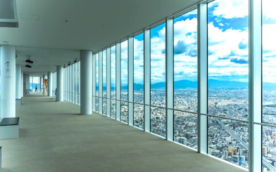 Harukas 300 Observatory interior with panoramic view of Osaka city.