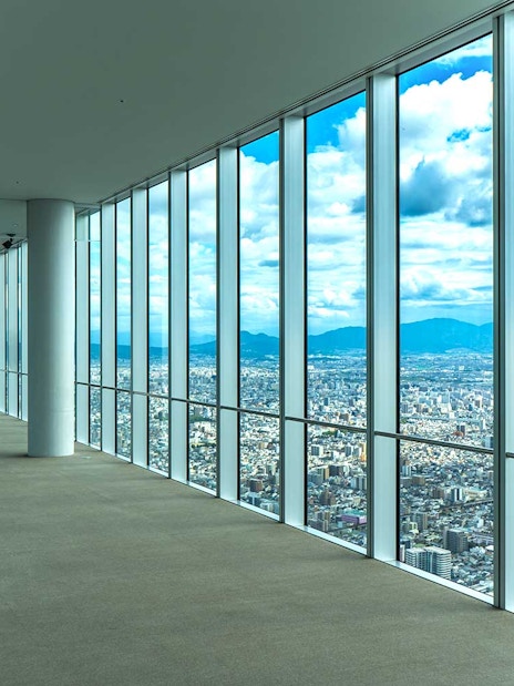 Harukas 300 Observatory interior with panoramic view of Osaka city.