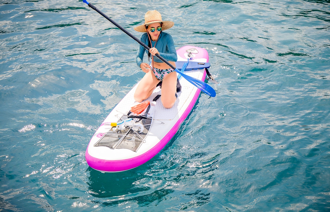 Woman kayaking at Adventure Bay Island