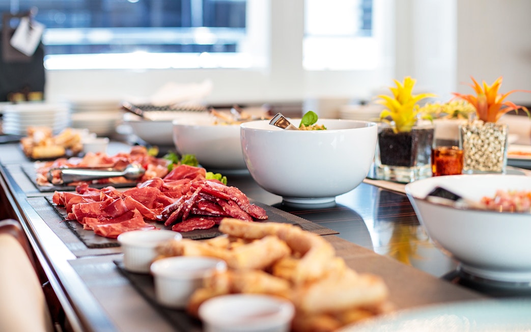 Buffet spread with meats and salads on a Nile cruise lunch.