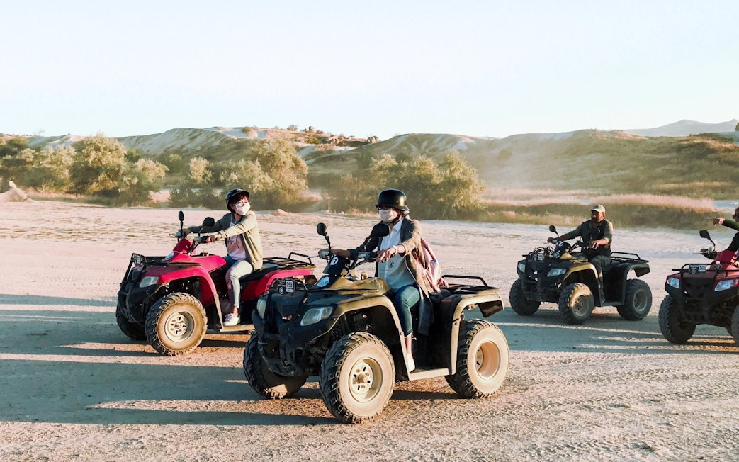 ATV riders exploring the scenic landscape of Cappadocia.