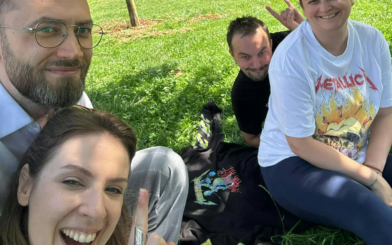 Group enjoying a sunny day on grass during the Jewel of Brașov tour, Schei, Brașov.