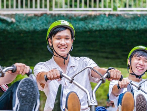 Riders enjoying the Skyline Luge Singapore experience.