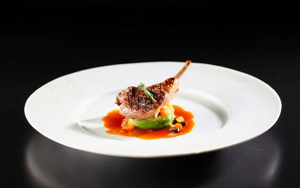 Lamb chop with vegetables and sauce at Sky Restaurant 634 Grand Room Luxe Dinner.