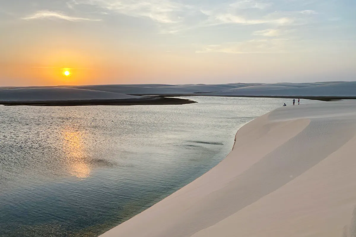 Sunset over dunes and lagoon in Atins, part of the 4x4 tour from Sao Paulo.
