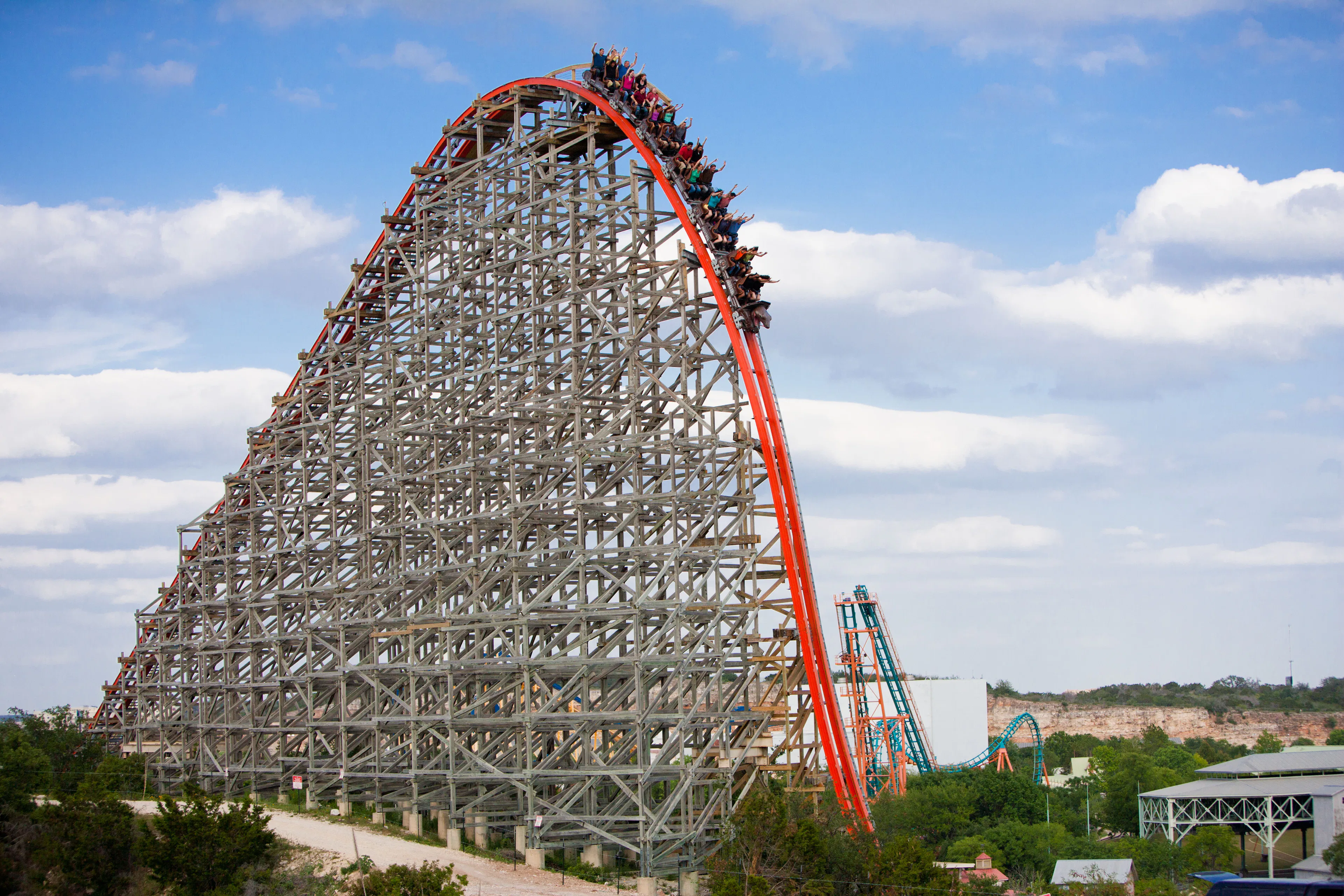 Roller coaster Iron Rattler at Six Flags Fiesta Texas with steep drop.