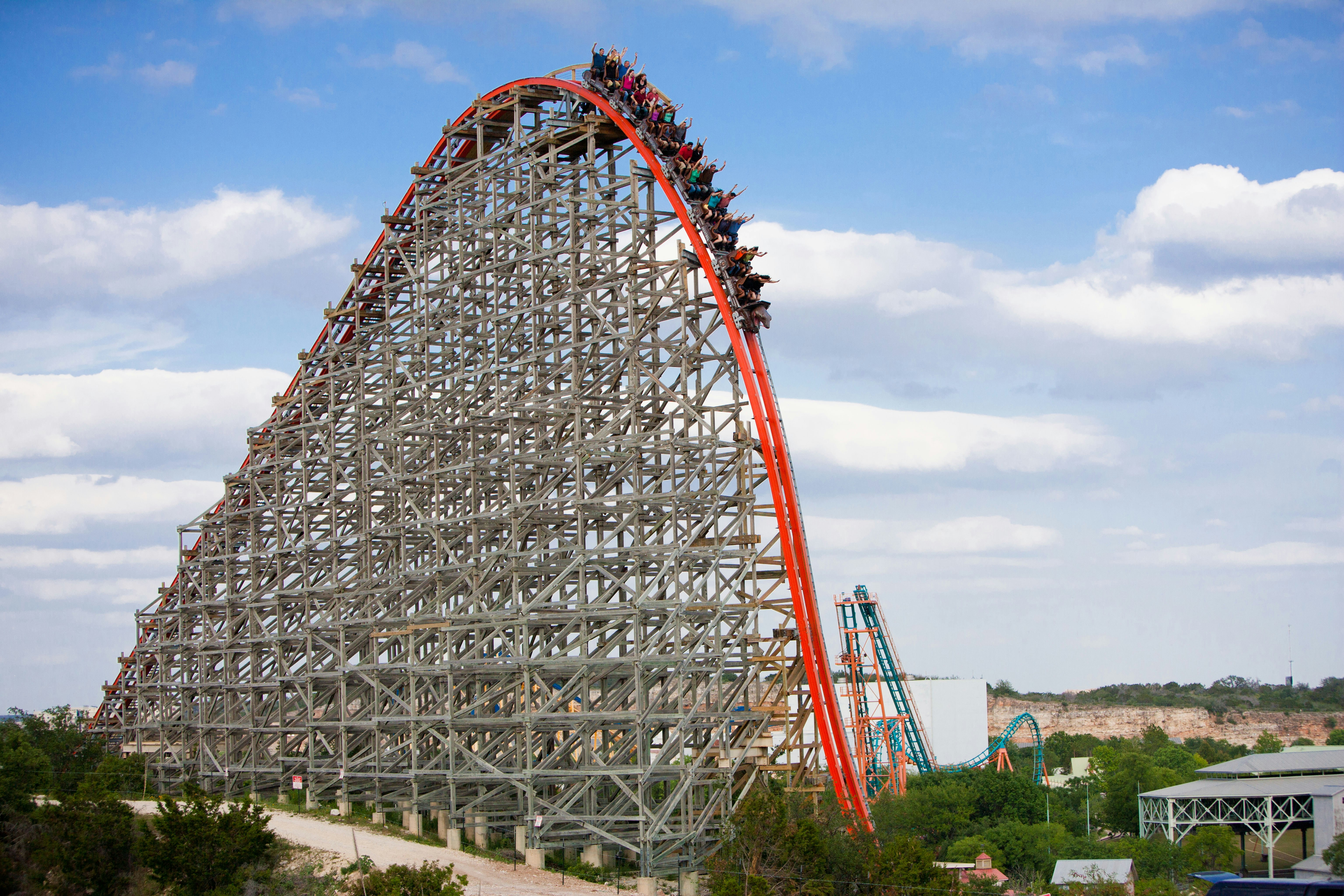 Roller coaster Iron Rattler at Six Flags Fiesta Texas with steep drop.