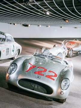 Historic Mercedes-Benz race cars on display at the Mercedes-Benz Museum.