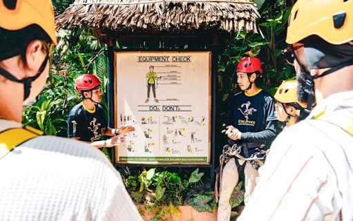 Participants receiving safety instructions for Flying Hanuman zipline tour in Phuket.