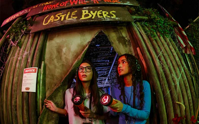 Guests exploring Castle Byers at Stranger Things experience, Netflix House, Philadelphia.