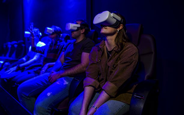 Visitors experiencing VR Ride at Planet Wildlife Immersive Exhibition.