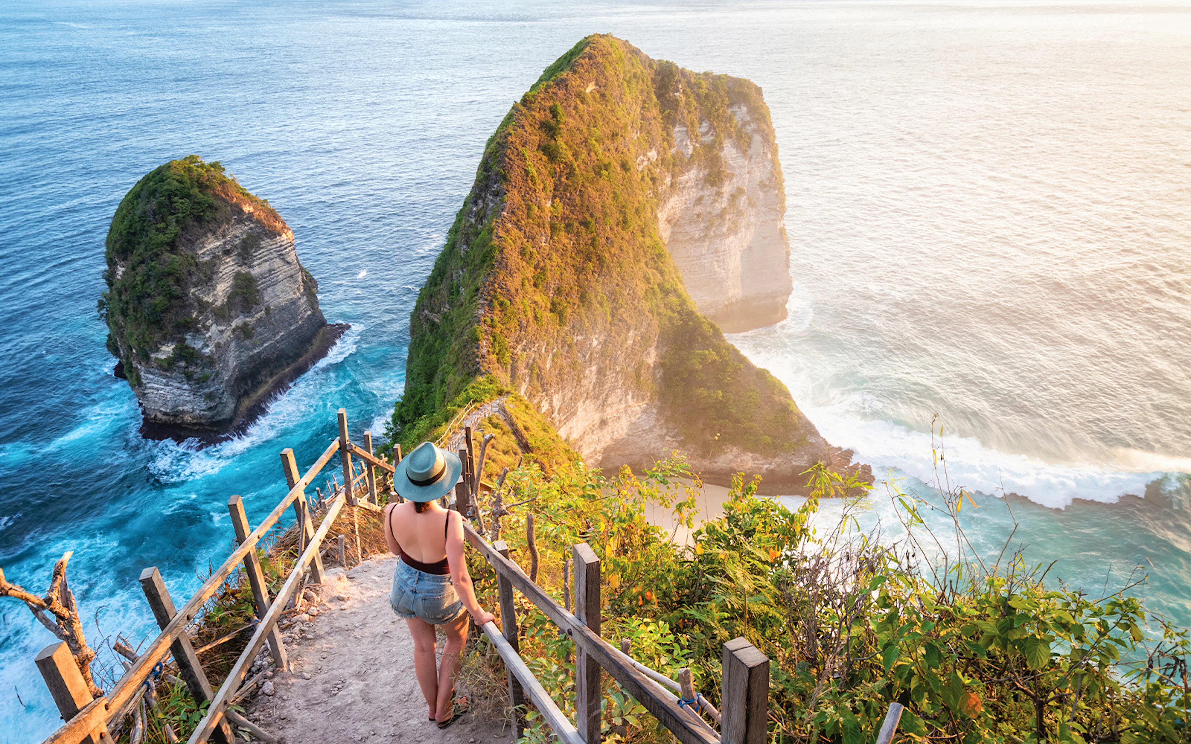 Tourists exploring the scenic beauty of East/West/South Nusa Penida Island on an Instagrammable Private Tour with Hotel Transfers
