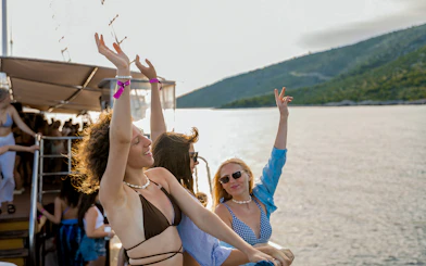 Participants enjoying the Blue Lagoon Boat Party in Split, Croatia.