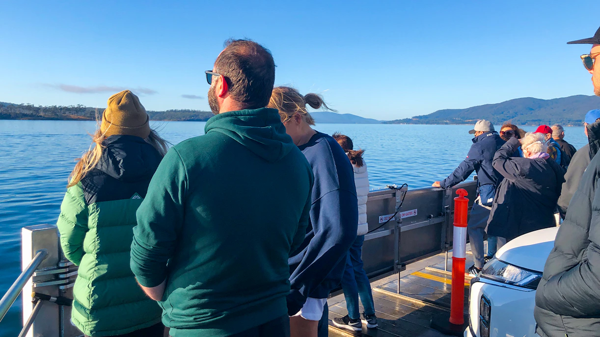 Bruny Island coastline view with lighthouse, part of Hobart full-day guided tour.