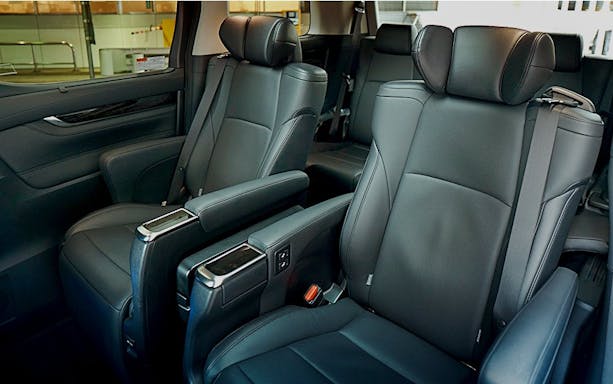 Interior seating of shuttle transfer to Tokyo Disneyland.