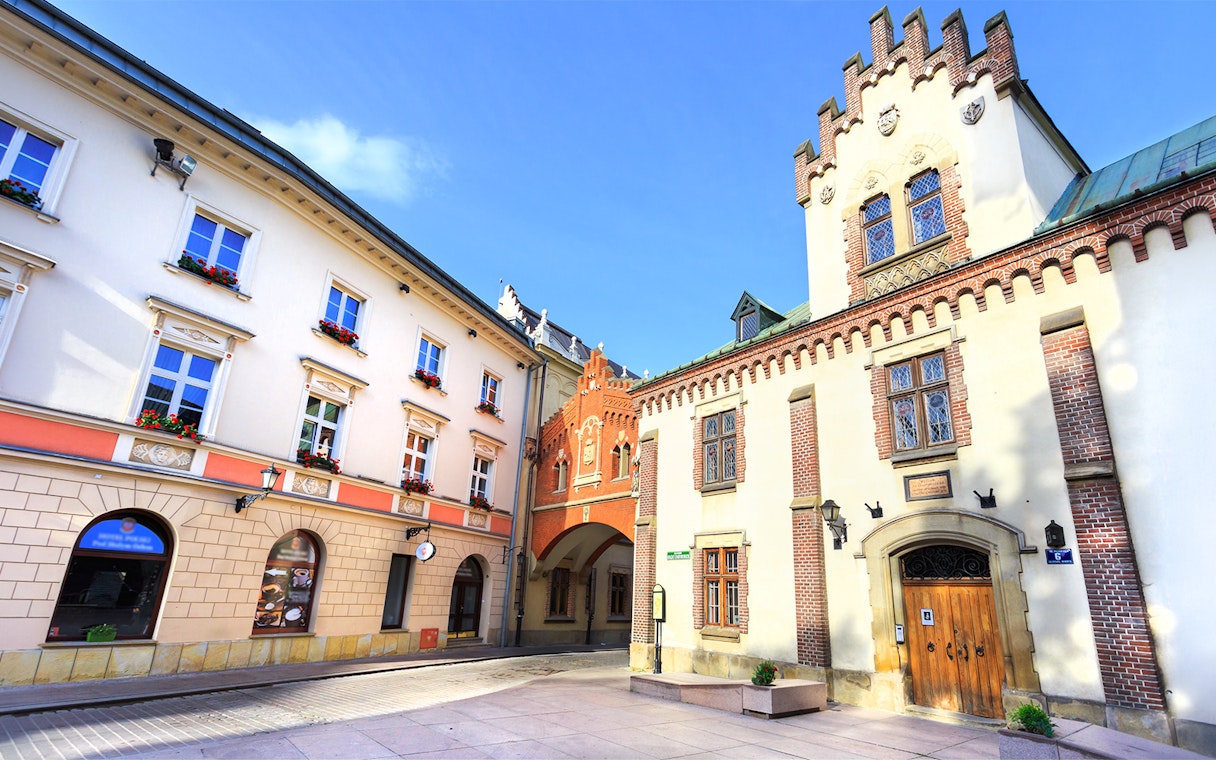 Czartoryski Museum and Library courtyard in Krakow, Poland, featuring historic architecture.