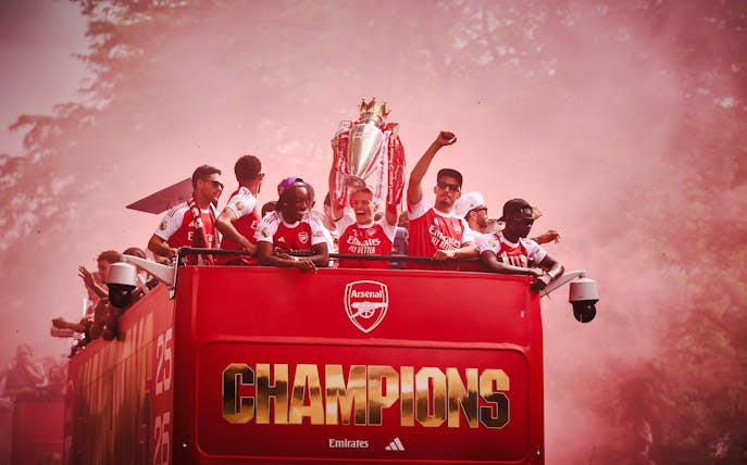 Arsenal players celebrate on an open-top bus during the 2026 Premier League Champions Parade.