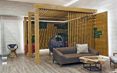Mera VIP Lounge seating area with modern decor at Cancun International Airport.