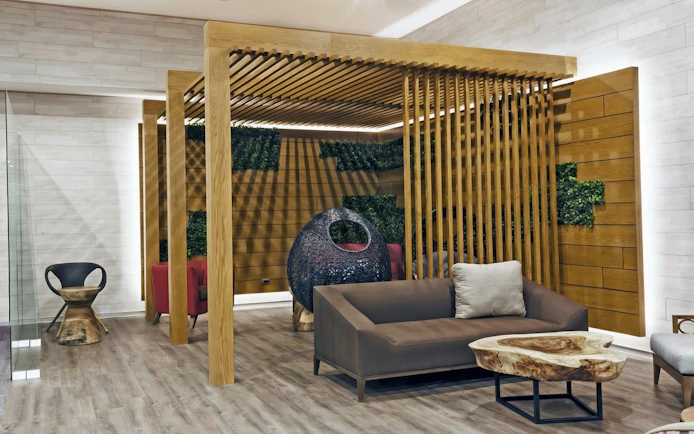 Mera VIP Lounge seating area with modern decor at Cancun International Airport.