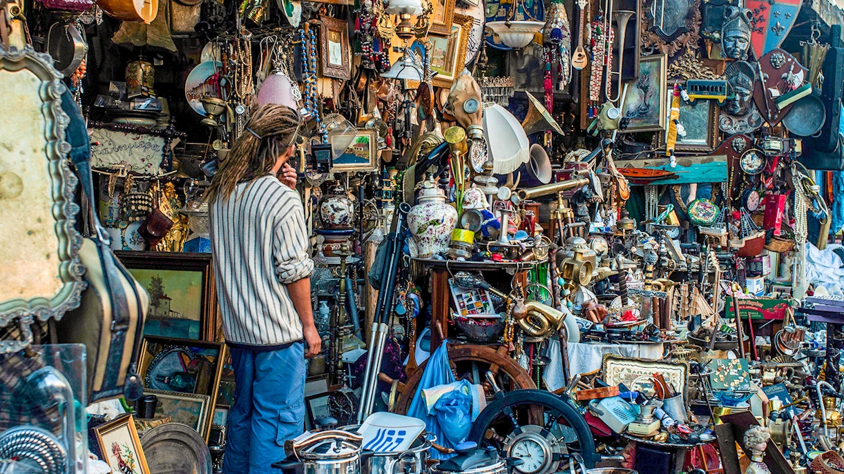 Mercato delle Pulci stalls with vintage items and antiques in Florence, Italy.