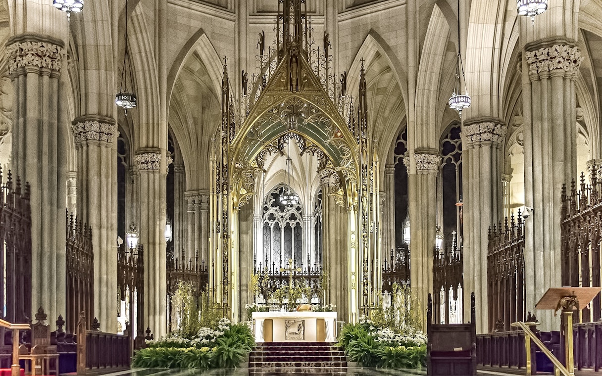 St. Patrick's Cathedral altar with ornate arches and detailed architecture, New York City.