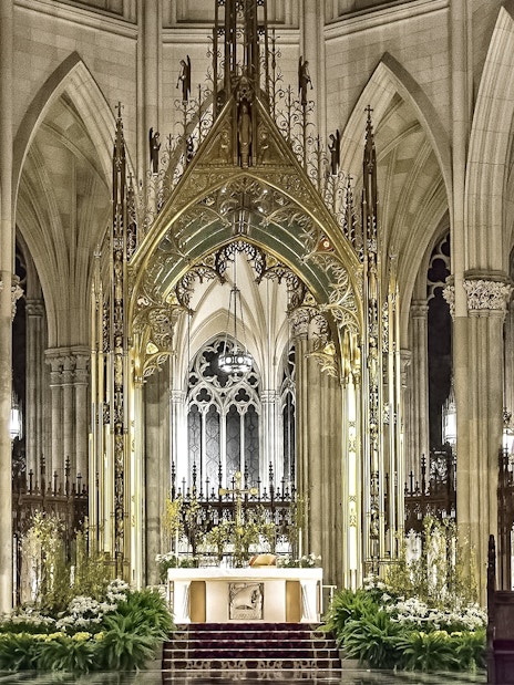 St. Patrick's Cathedral altar with ornate arches and detailed architecture, New York City.