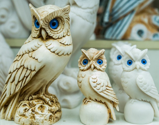 Owl museum entrance near Habitat Penang Hill, Malaysia, with lush greenery and clear blue skies