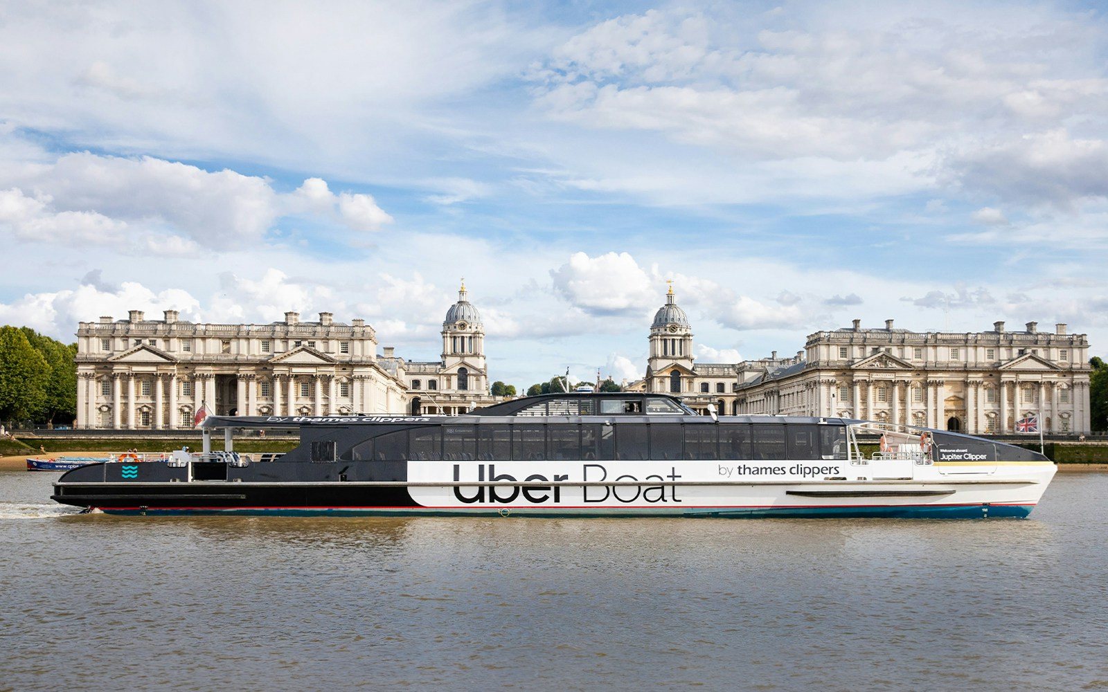 Old Royal Naval College viewed from Uber Boat by Thames Clippers on the Hop-On Hop-Off Tour.