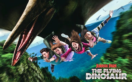 Tourists on The Flying Dinosaur ride at Universal Studios Japan.