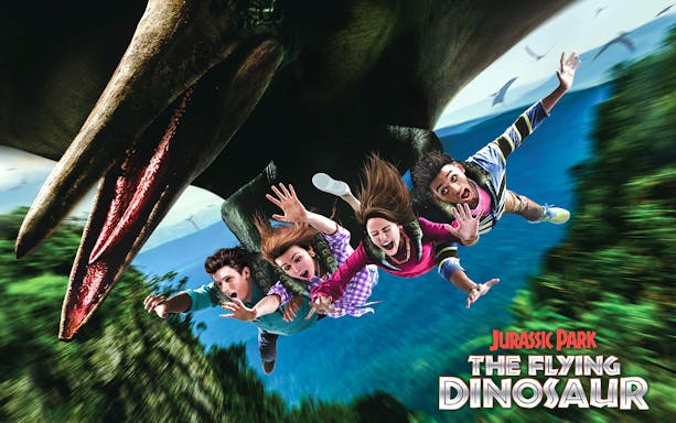 Tourists on The Flying Dinosaur ride at Universal Studios Japan.