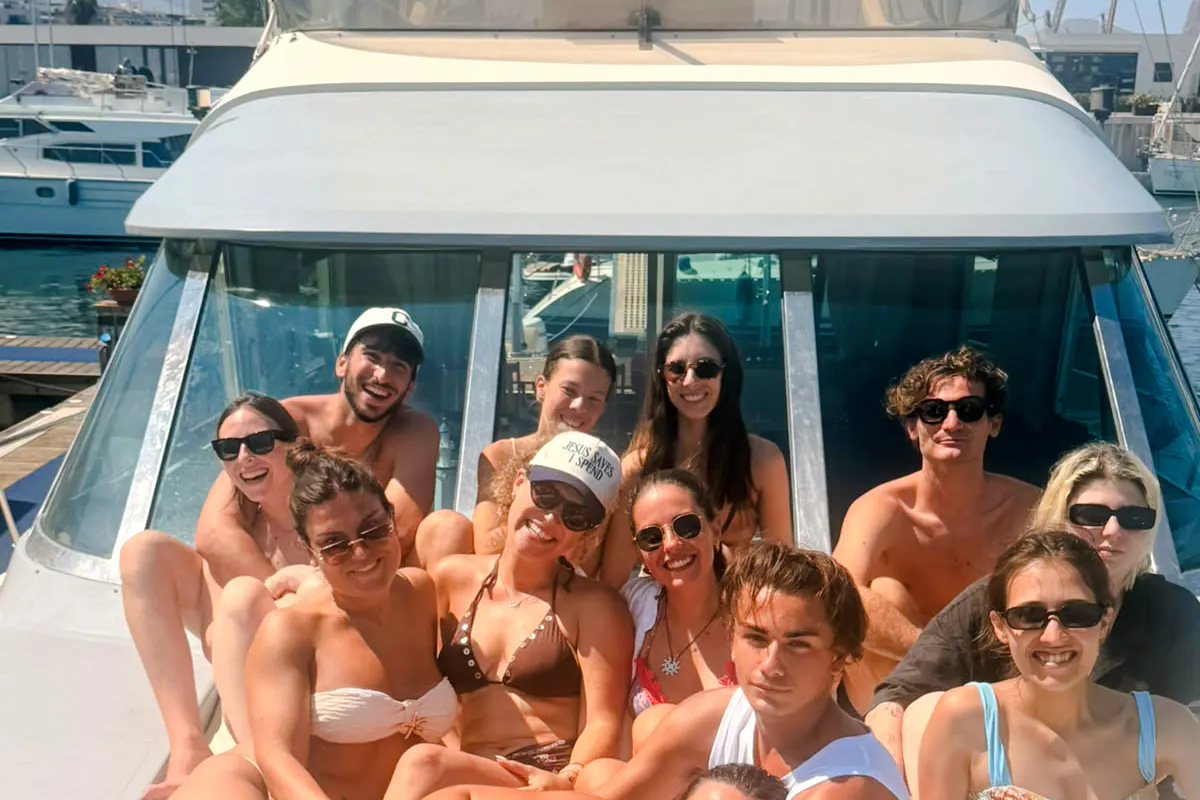 Group enjoying a boat tour in Mondello, Palermo.