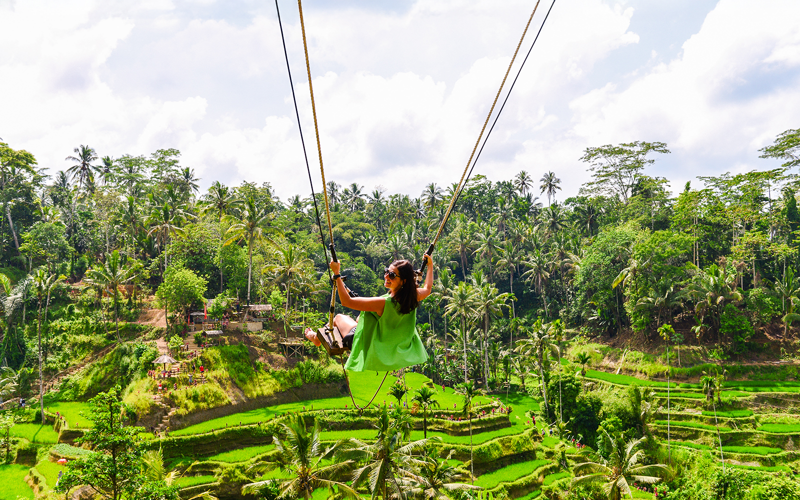 Swinging over rice terraces in Ubud, Bali, Indonesia.