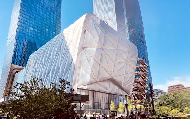 Hudson Yards architecture in New York City with modern buildings and The Vessel.