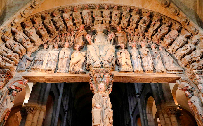Portico of Glory sculptures inside Cathedral of Santiago de Compostela, Spain.