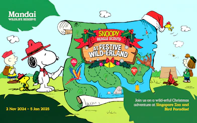 Snoopy and friends with a festive map at Mandai Wildlife Reserve, highlighting Singapore Zoo and Bird Paradise.